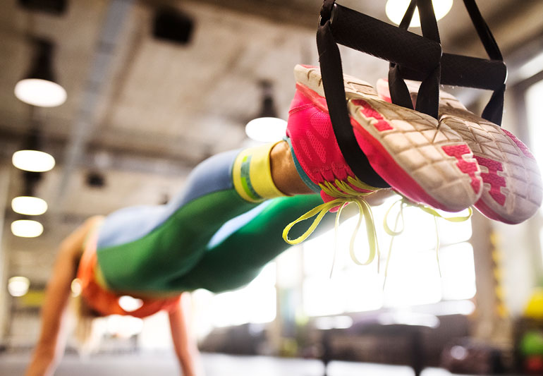 Pushups Got You Down? Kick Your Core Routine Into High Gear With These Suspension Trainer Exercises