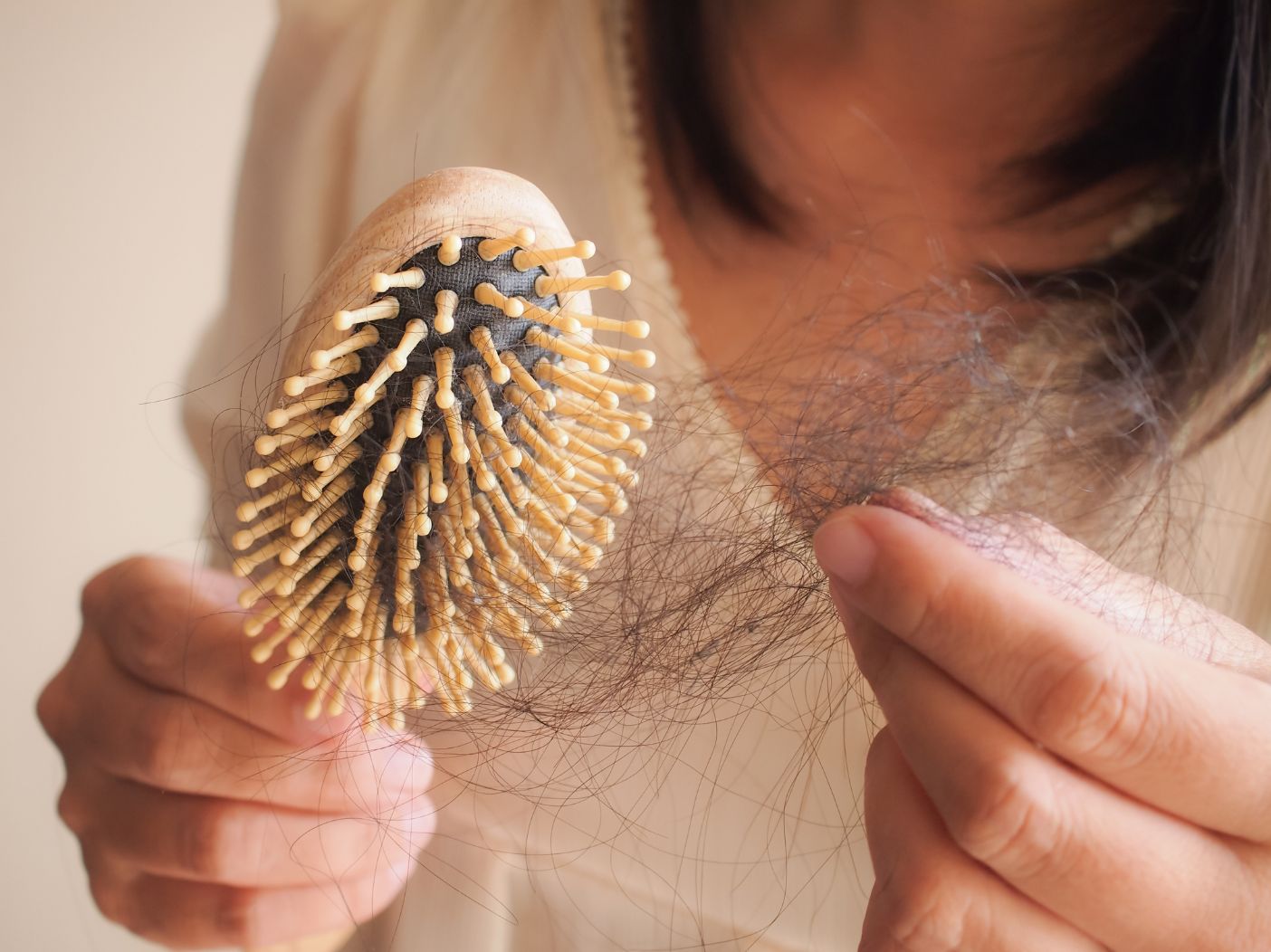 Hair Thinning Or Falling Out? It Could Be A Side Effect Of Menopause